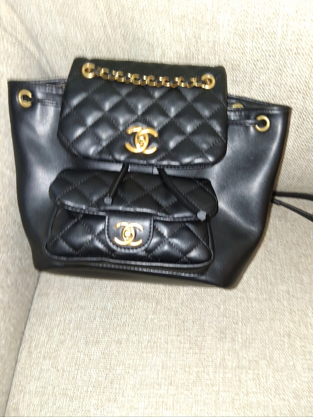 CHANEL Black Quilted Leather Backpack with Gold Hardware